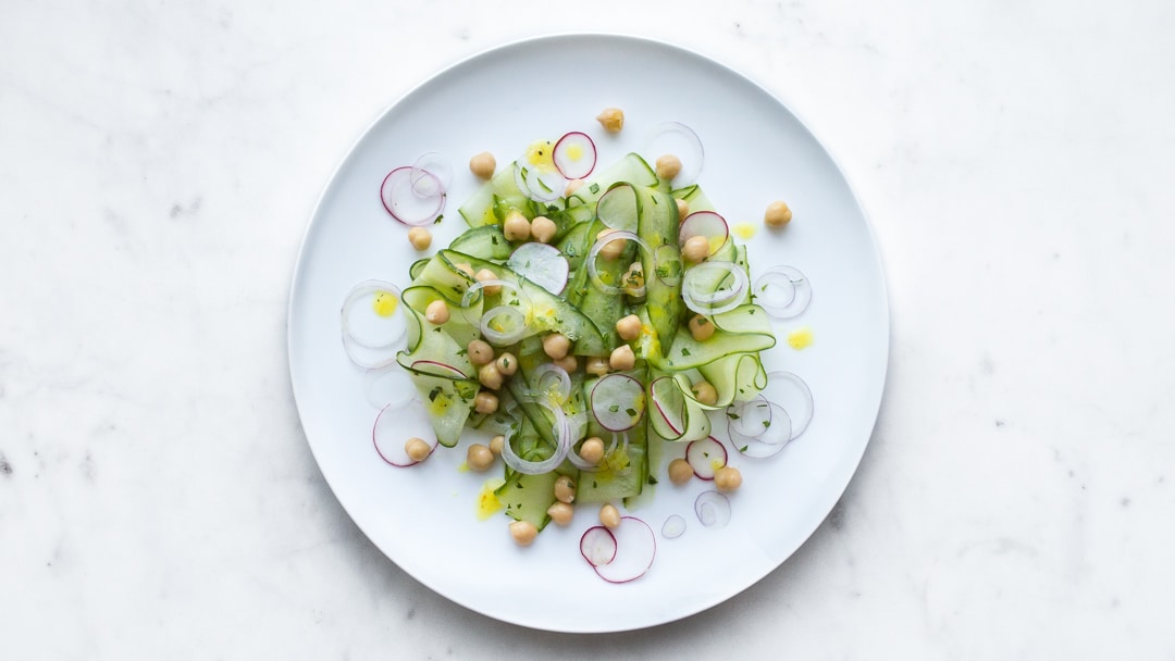 Close Up of Cucumber Chickpea Salad on a White Plate