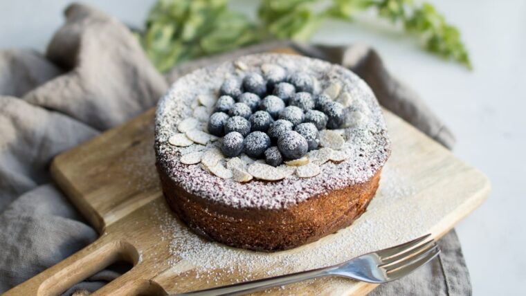 Flourless Almond Cake with blueberries and slivered almonds