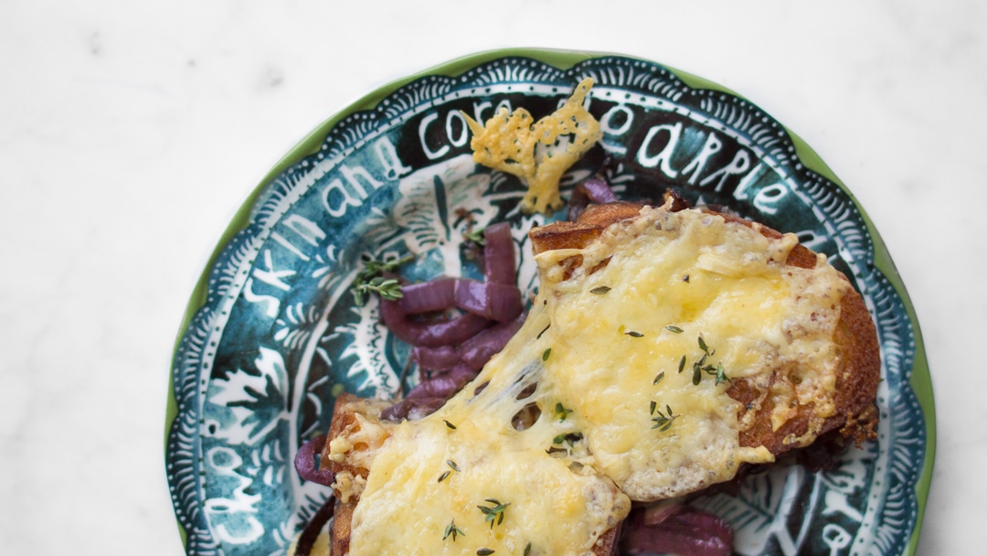 grilled cheese melt on a green patterned plate