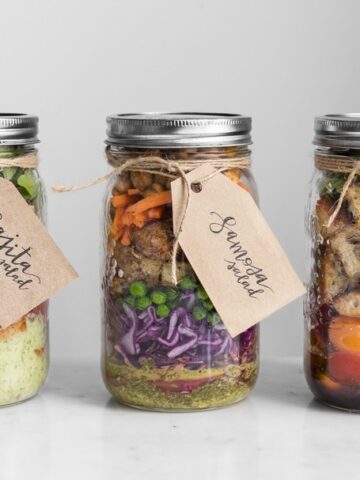 Three different salads in mason jars