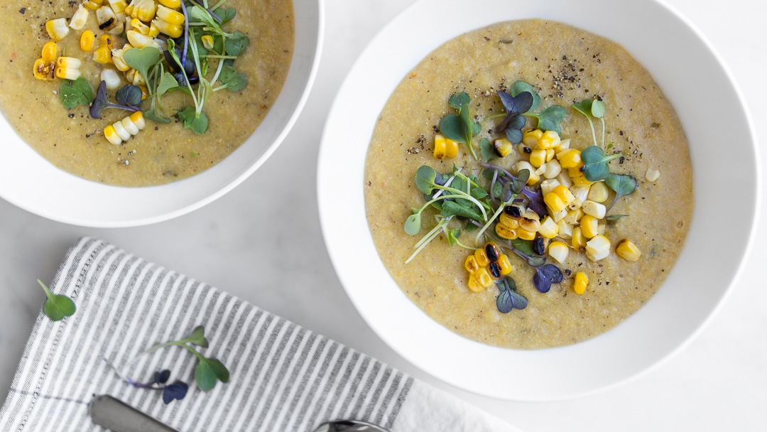 Two White Bowls of Coconut Corn Chowder