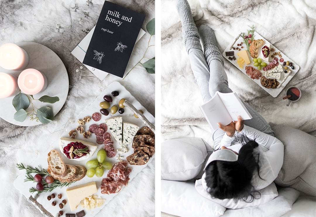 Two pictures: Left picture has comforting cheeseboard, candles and Milk and Honey Book. Right pictures has female reading a book next to the cheeseboard.