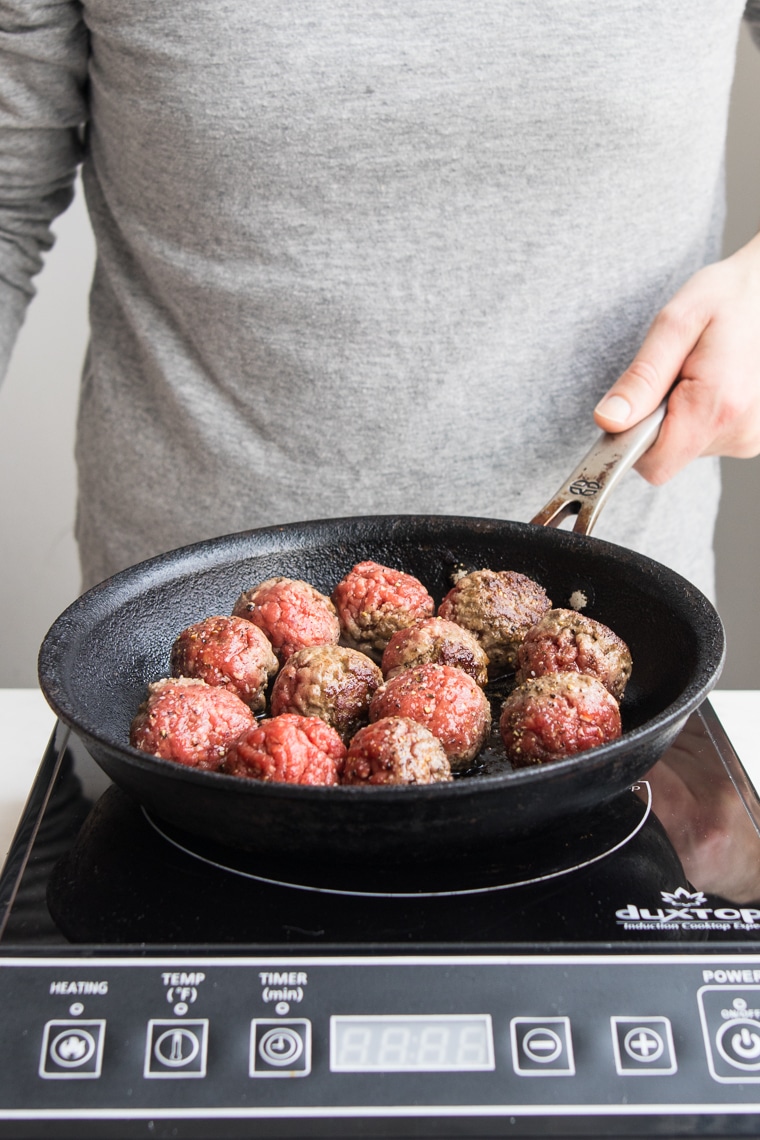 Frying meatballs in a cast iron skillet