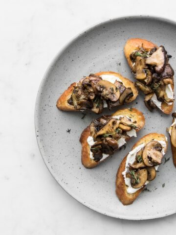 Close up of Mushroom Toast on a grey plate