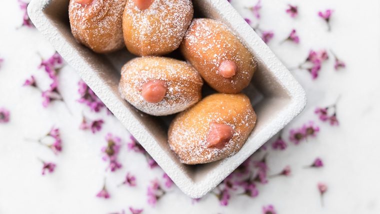 5 Custard Filled Donuts with Powdered Sugar