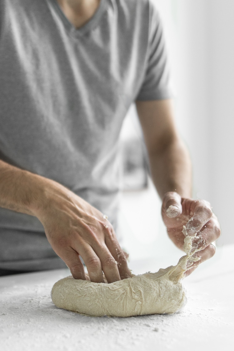 Hands Kneading Pizza Dough