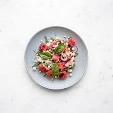 Chicken, Watermelon and Feta Salad on a blue plate