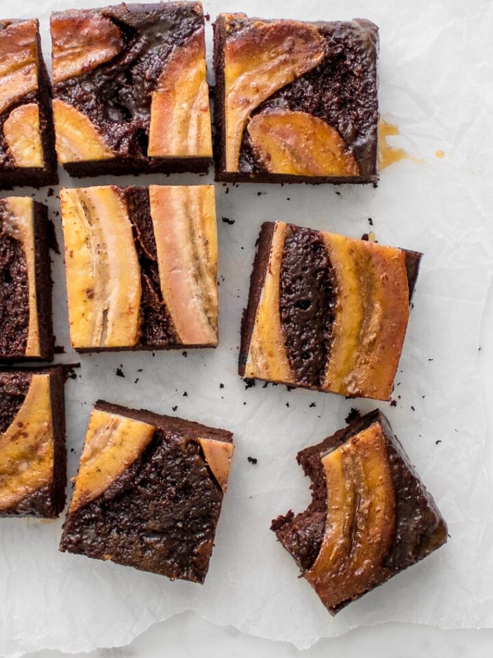 The upside down chocolate banana cake sliced into squares