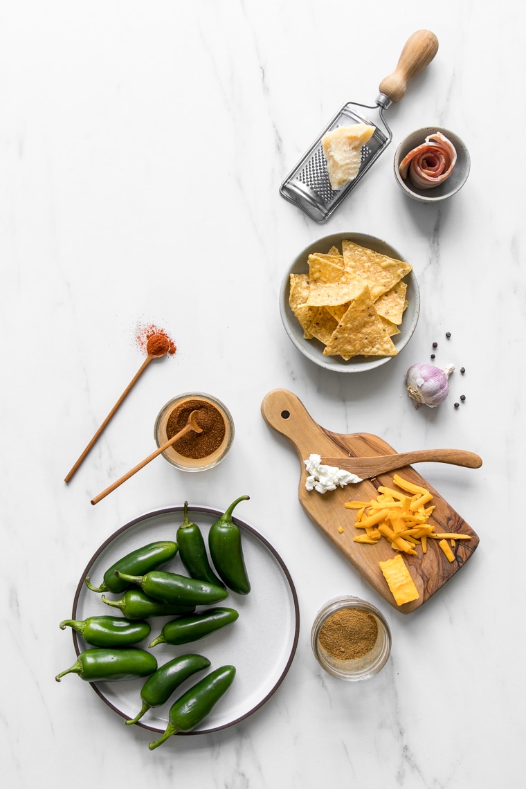 Ingredients for roasted jalapeno poppers in flat lay style