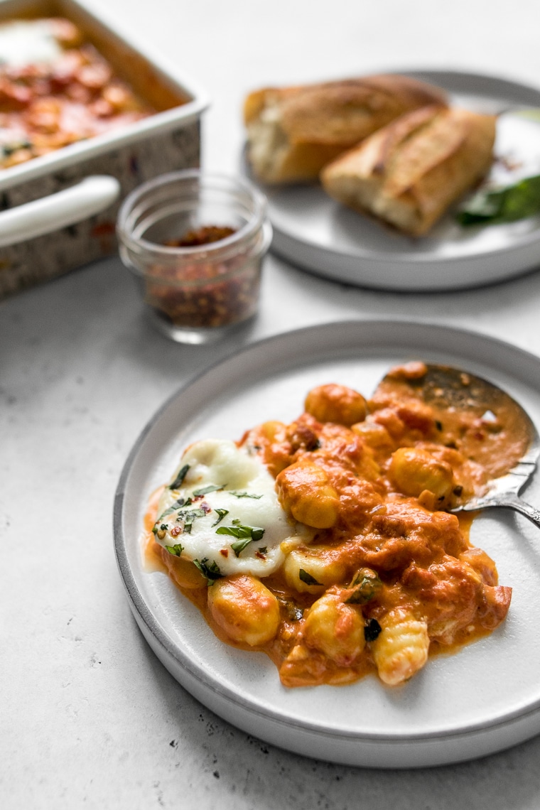 Side image of a plate filled with Gnocchi with Vodka Sauce