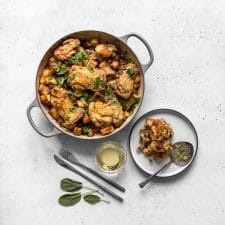 One Pot Chicken and Stuffing Casserole and plated with white wine and sage leaves