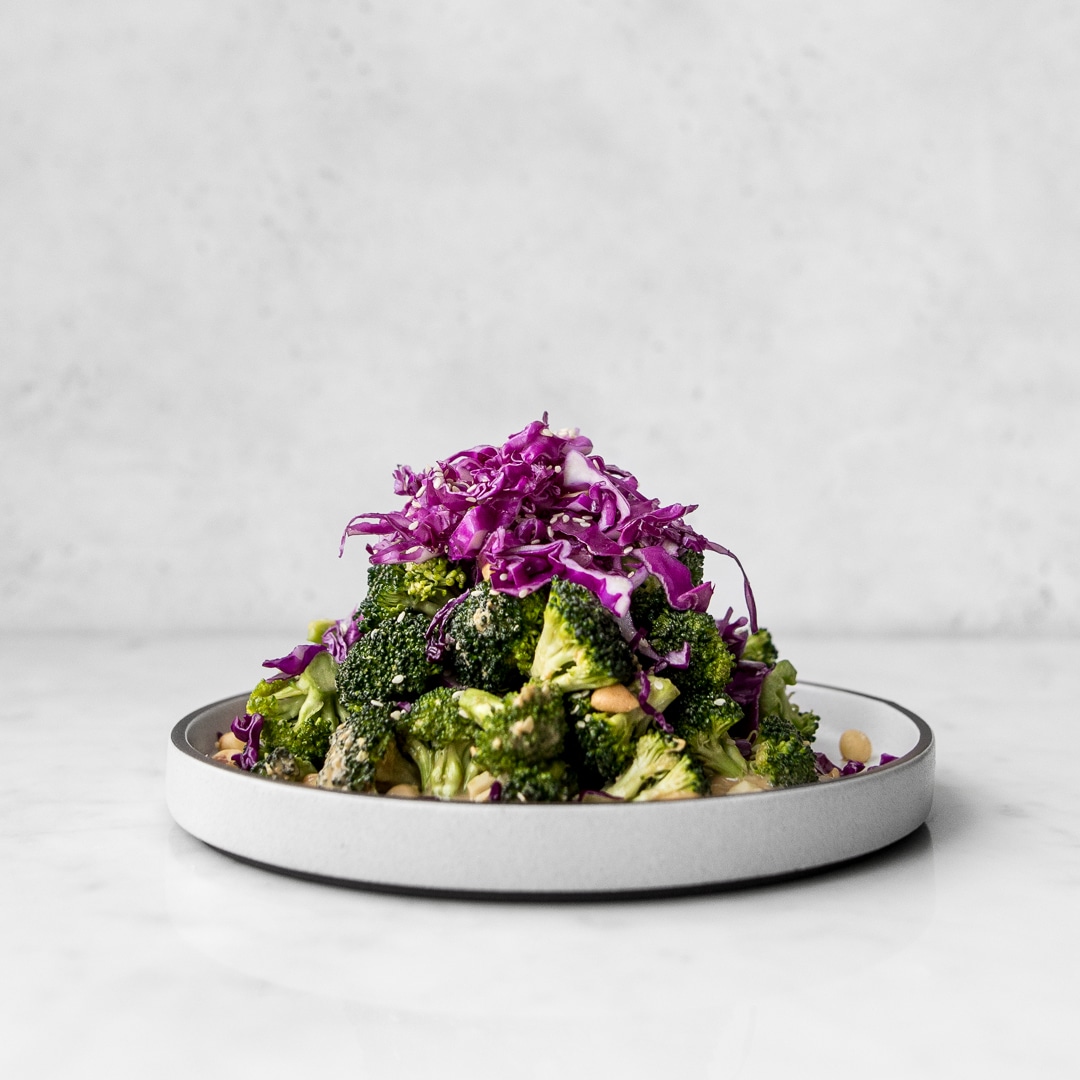 Plate of broccoli salad with red cabbage and peanu