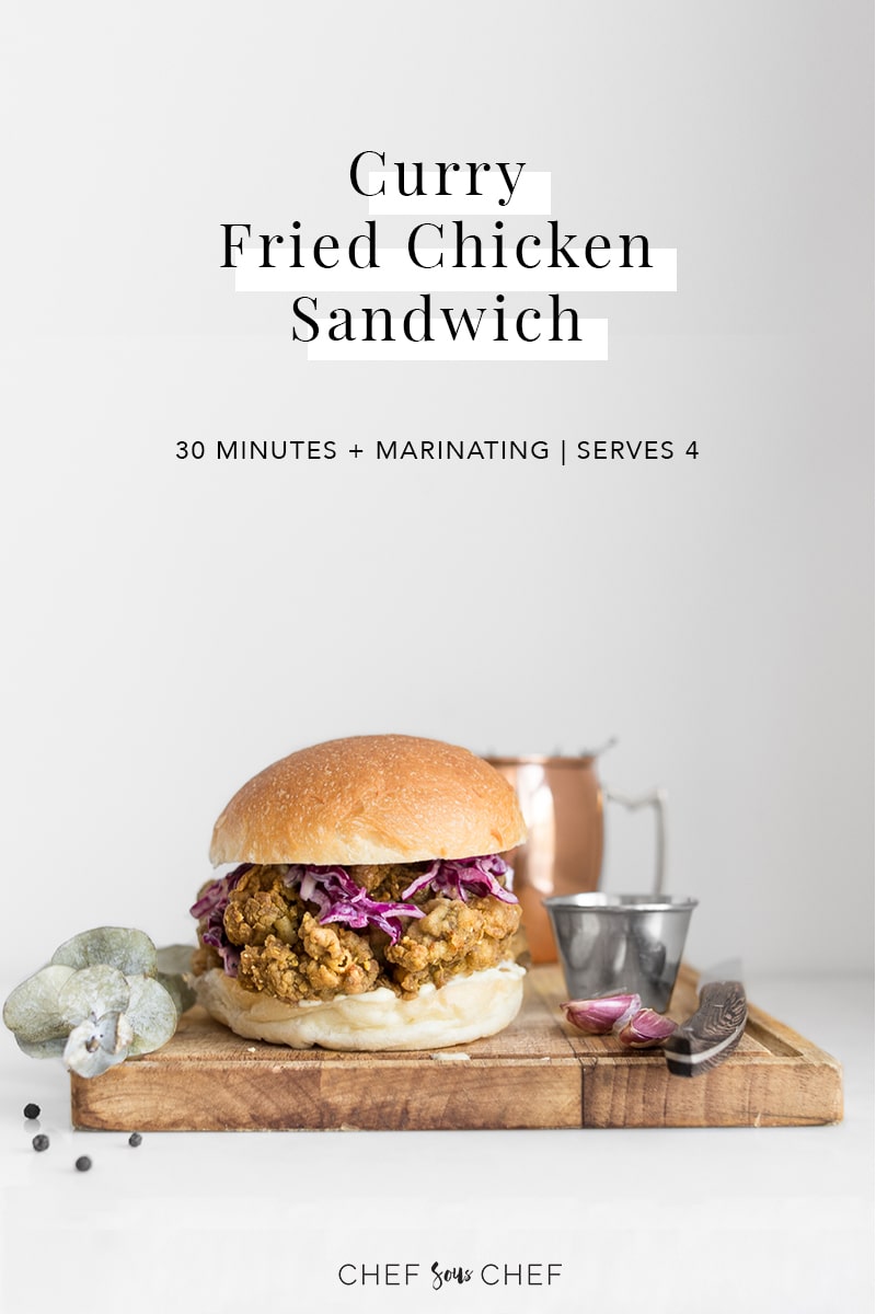 Curry Fried Chicken Sandwich on a cutting board with text overlay