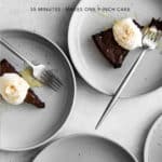 # slices of Flourless Chocolate Cake on Plates with Whipped Cream and Honey
