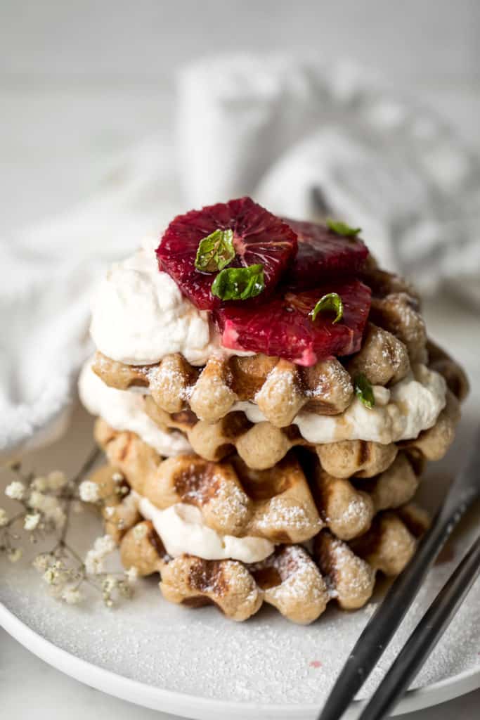 Four Belgian Waffles with Whipped Cream and blood Oranges