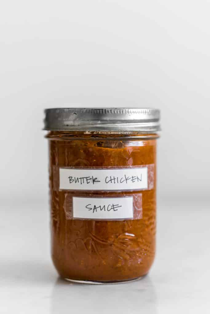 Homemade butter chicken sauce in a mason jar