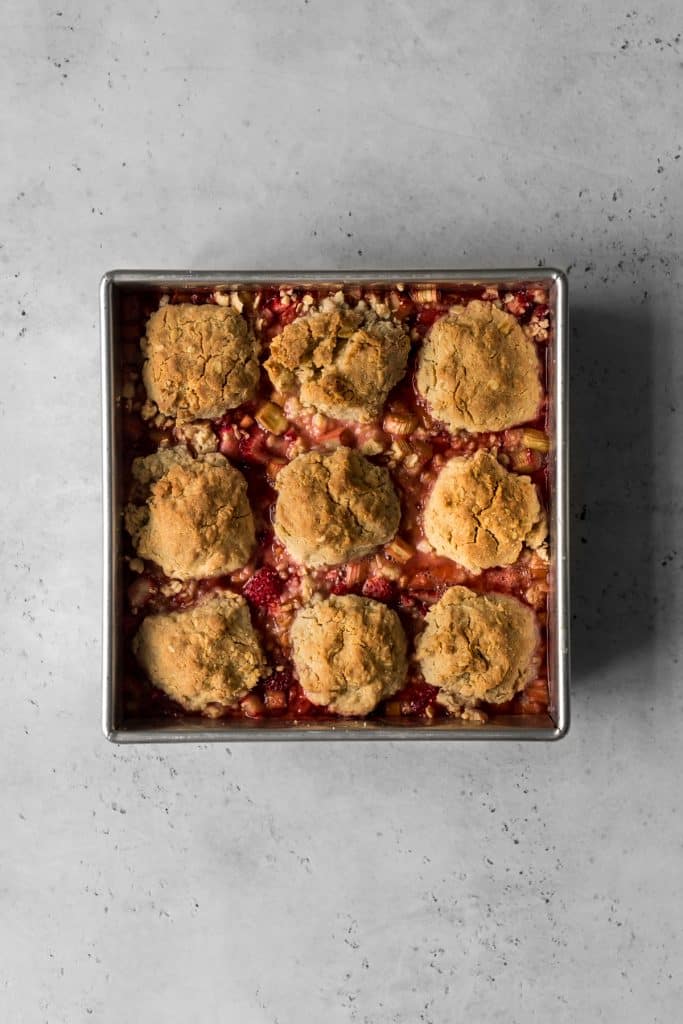 Strawberry Rhubarb Crisp with Biscuit Topping in baking pan
