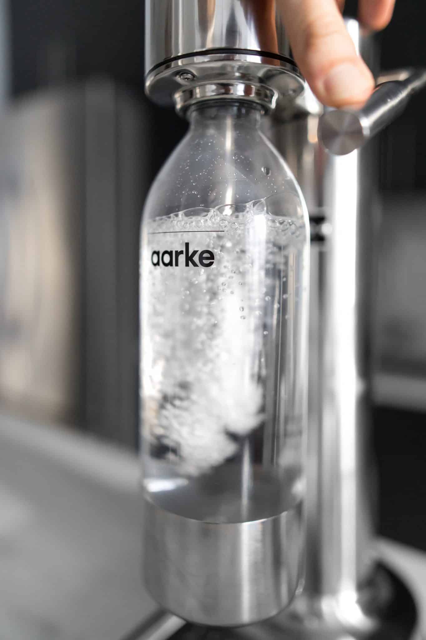 Close up of Aarke Carbonator III making Sparkling Water
