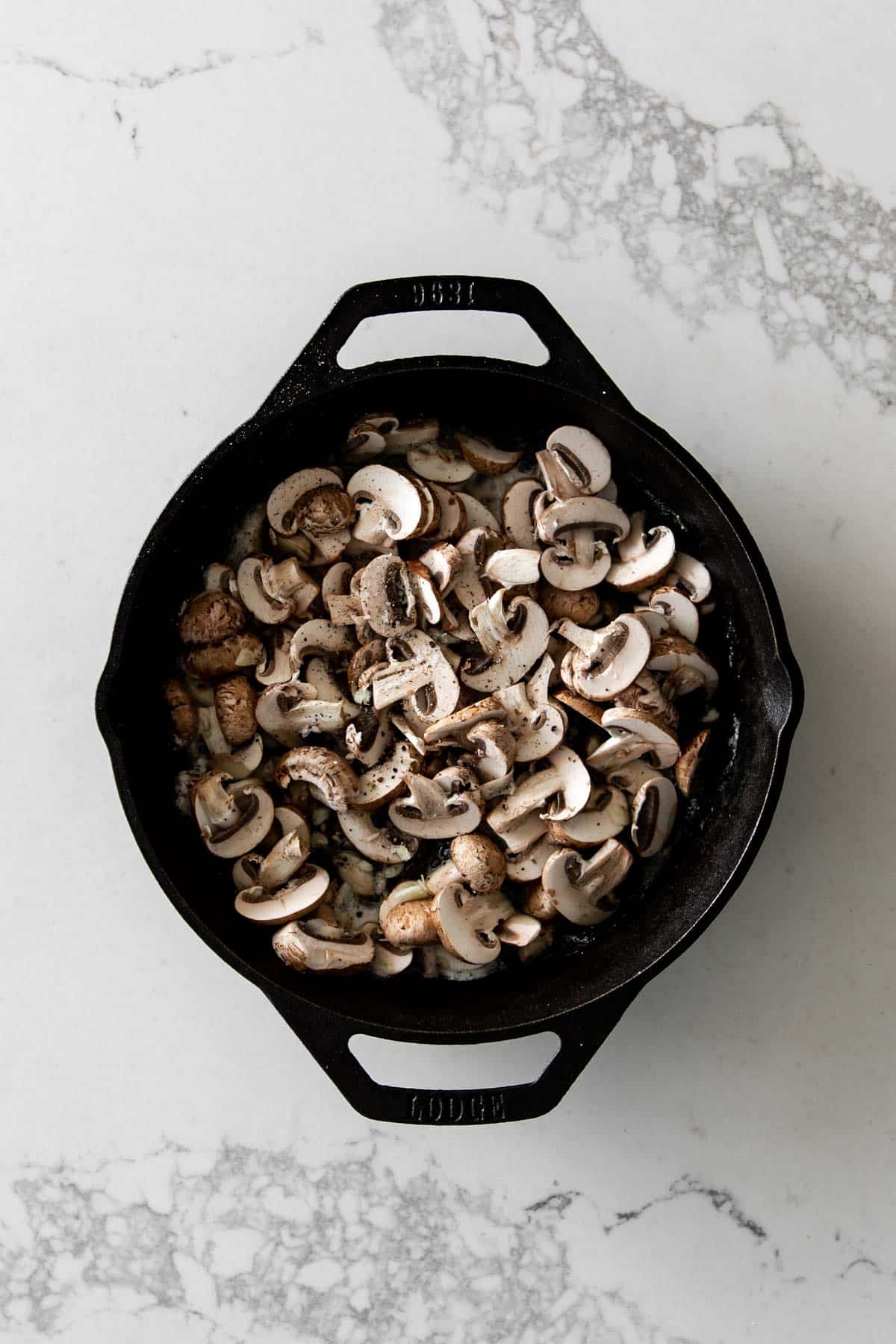 Mushrooms in a black cast iron skillet