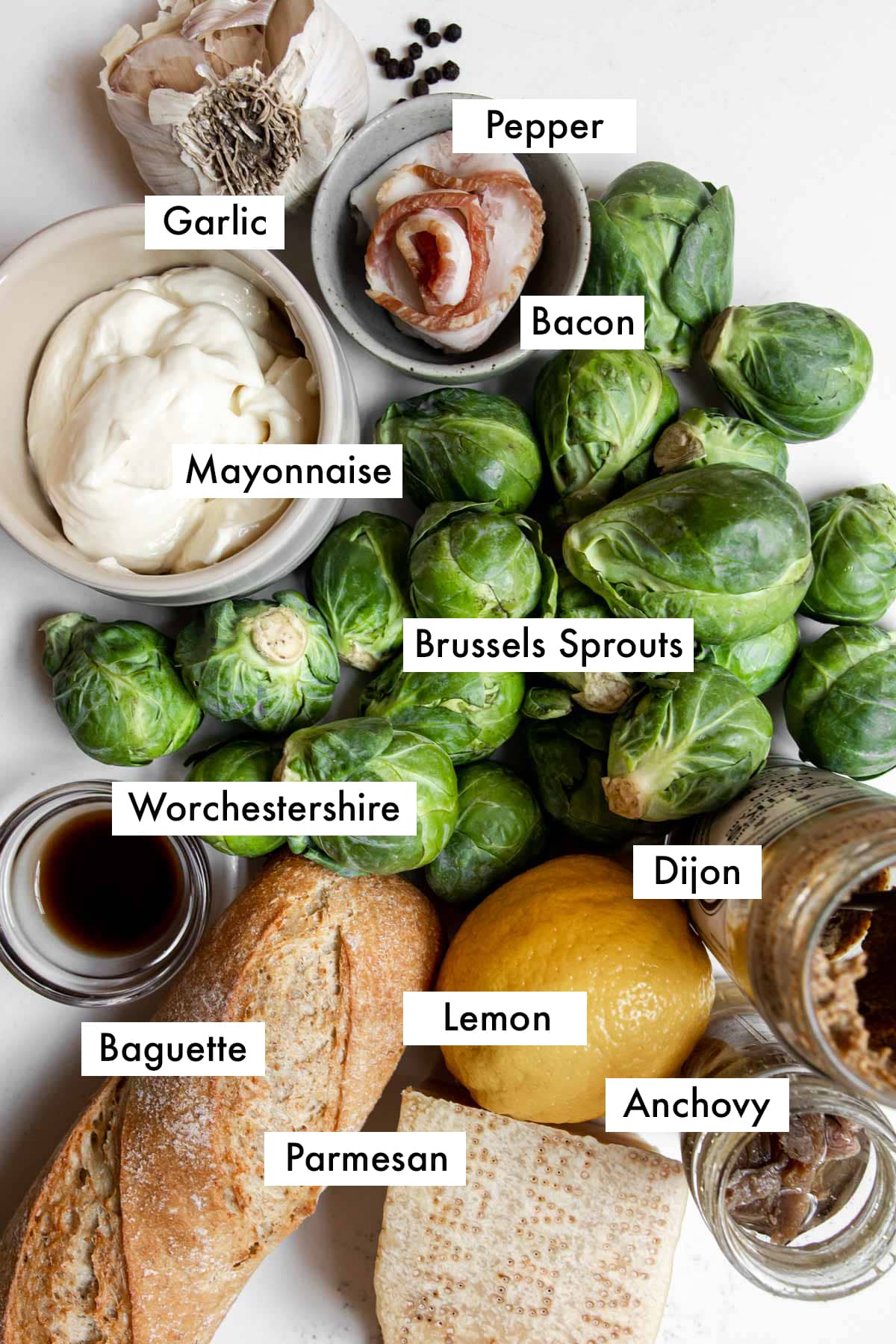 Brussels sprouts Caesar salad ingredients with labels.