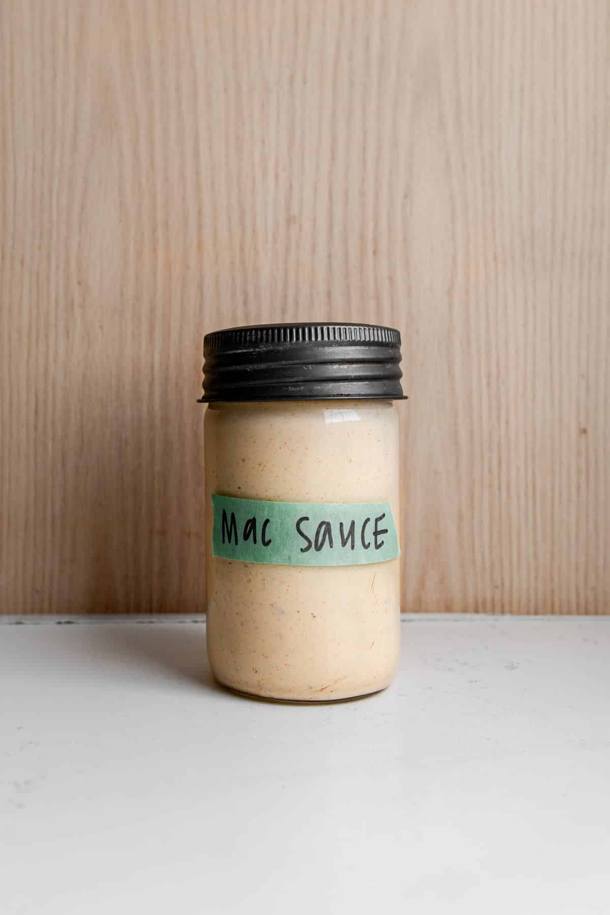 jar of big mac sauce sitting on a counter.