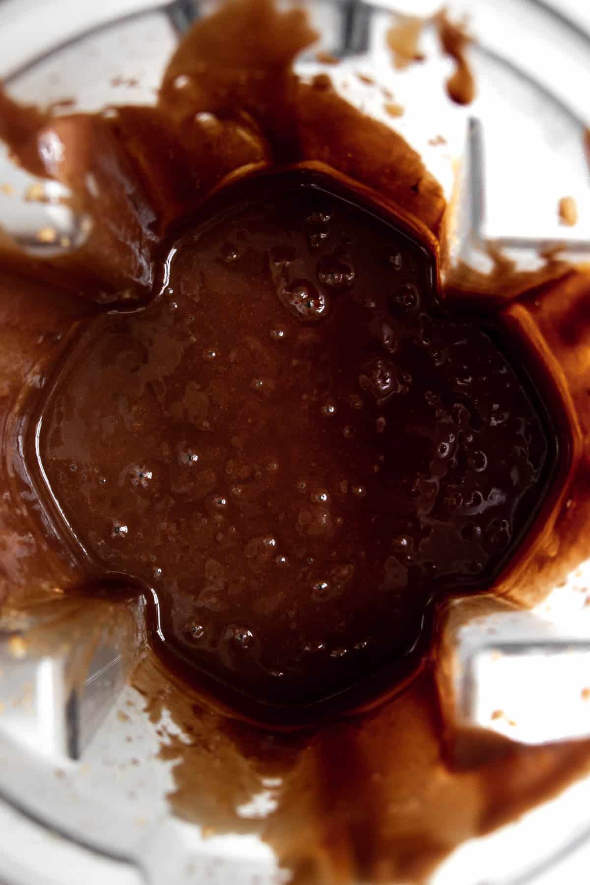 Creamy chocolate hazelnut spread in a blender.