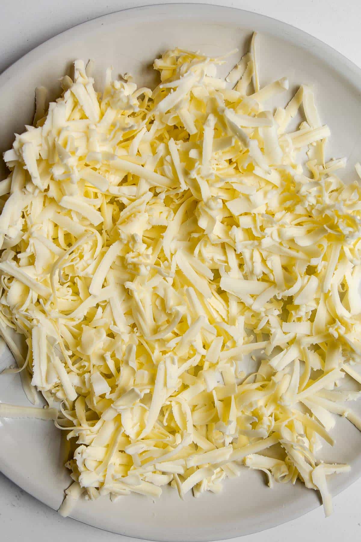 grated butter on a plate.