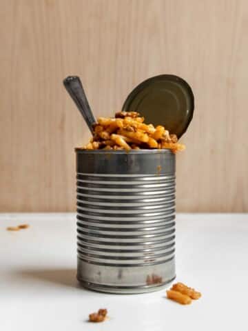 homemade beefaroni in a can with a fork.