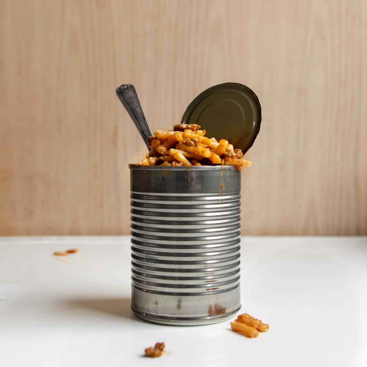 homemade beefaroni in a can with a fork.