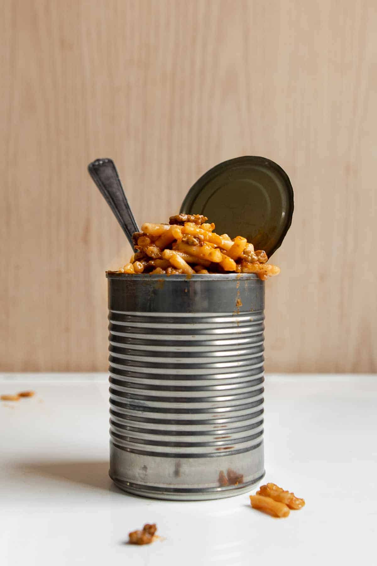 homemade beefaroni in a can with a fork.