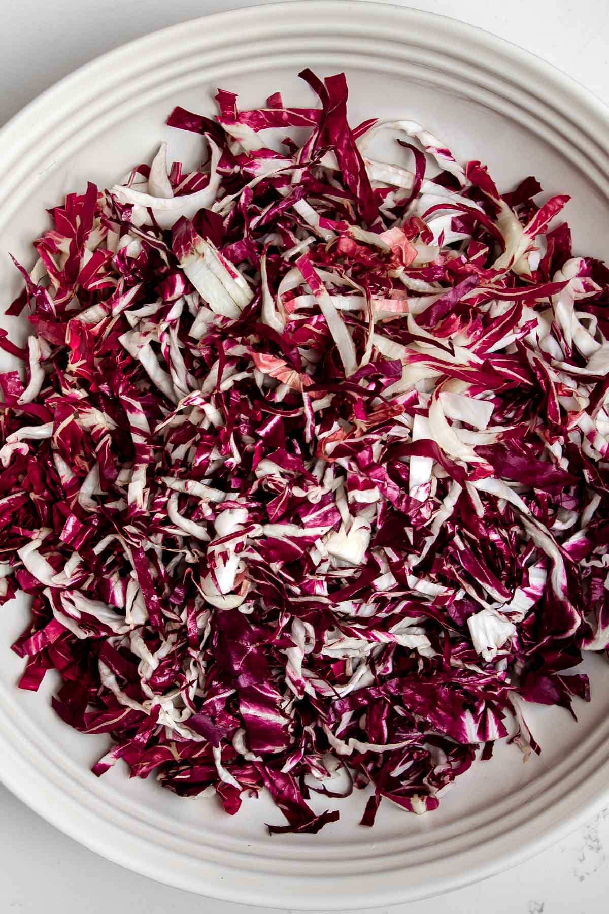 shredded radicchio in a bowl.