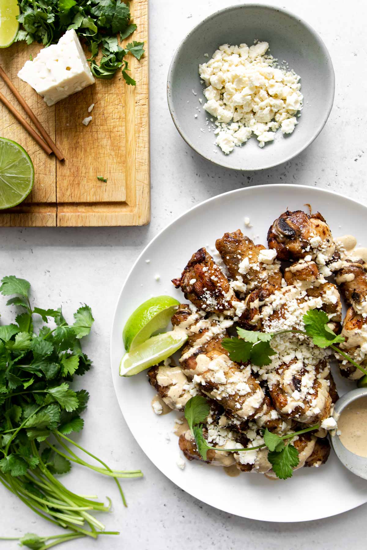 Mexican chicken wings topped with elote sauce, cotija cheese and cilantro.