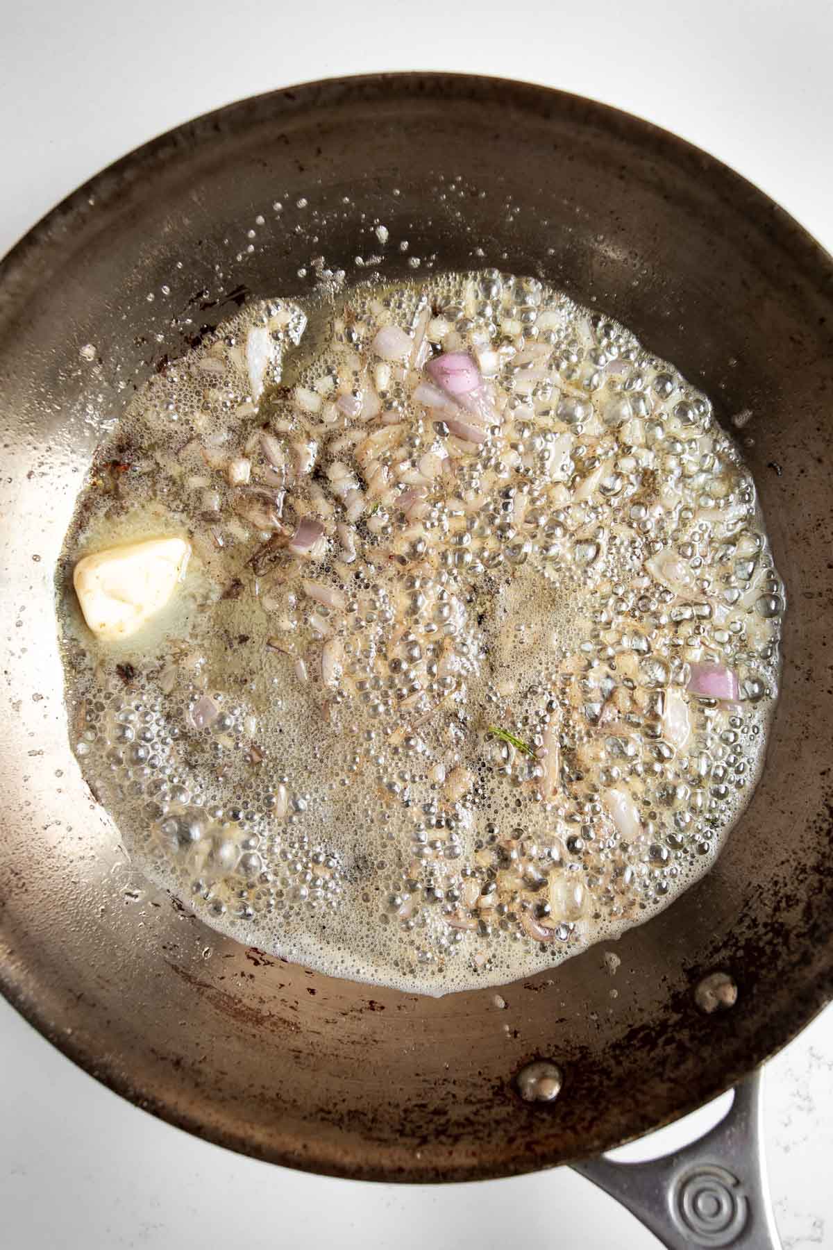 shallots and butter in a stainless steel pan